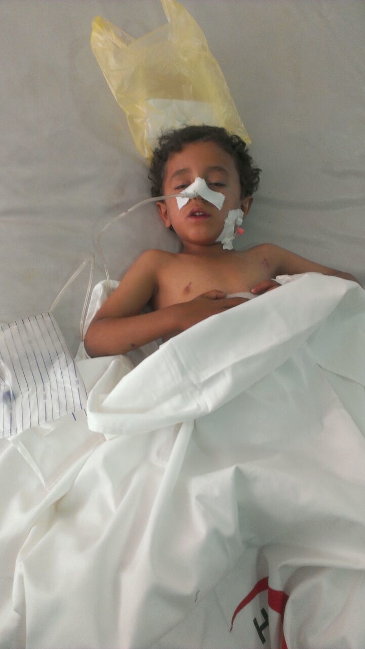Will Yemen truce allow aid in at last? A young boy injured in an explosion in Sanaa, Yemen, after a Saudi airstrike hit a weapons store in the city on Monday 11 May 2015