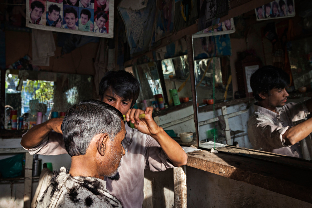 When Myanmar votes, Rohingya must stay home A Rohingya man gets his hair cut in the main market in Buthidaung, a township in Myanmar's western Rakhine State in early 2014.