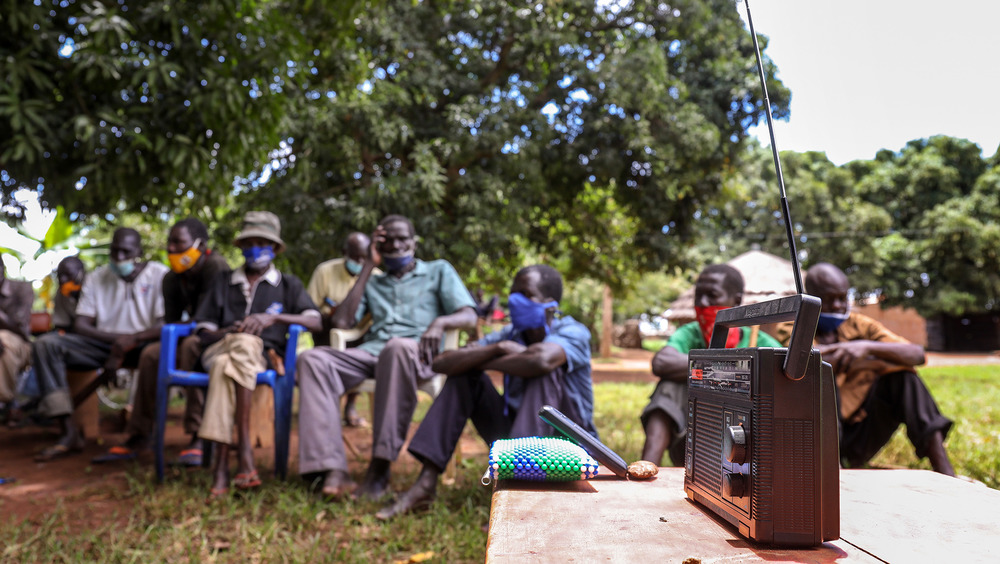 The community in Lukodi, where the Lord’s Resistance Army killed more than 60 people on 19 May 2004, gathered to hear the sentencing of rebel commander Dominic Ongwen by the International Criminal Court.