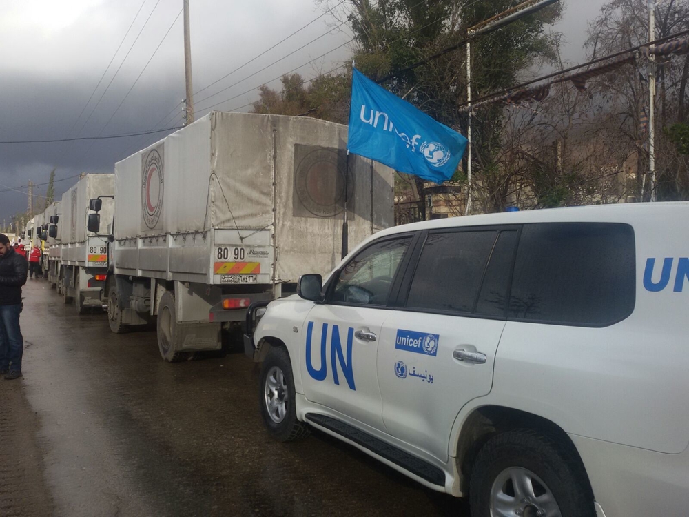 UN vehicles delivering supplies