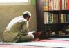 A Muslim student reciting the Qur'an in the late afternoon at the Jami Masjid in Kathmandu