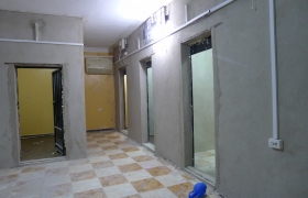 Four cell doors in an empty prison