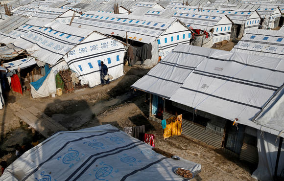 A man walks in the POC (Protection of Civilians) Camp, run by the UN Mission in South Sudan near the town of Malakal, in the Upper Nile state of South Sudan, September 9, 2018.