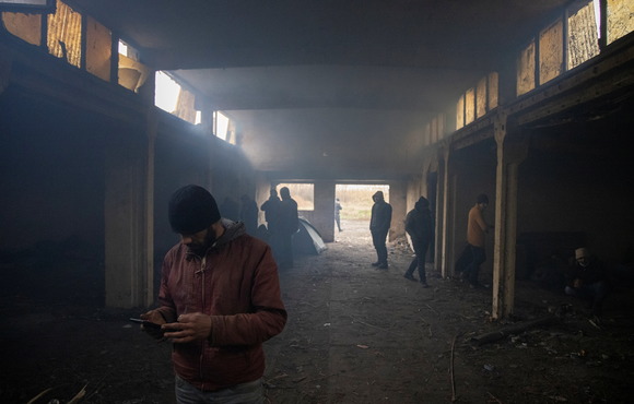 The EU is welcoming millions of Ukrainians but has adopted policies making it difficult for people from elsewhere to seek safety and opportunity in Europe, such as these sheltering in Majdan, Serbia in 2020, near the EU borders. 