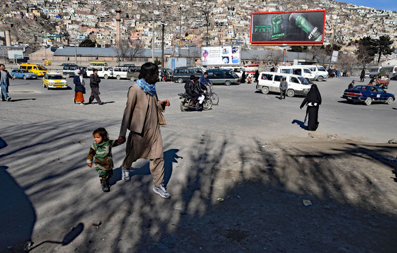 People walking in the streets of Afghanistan's capital Kabul earlier this year. Some young Afghans say they are more comfortable moving around because of a reduction in violence and street harassment of women.