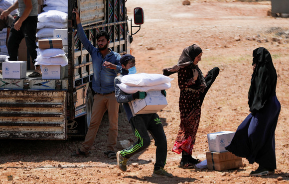 An aid delivery in rebel-held Idlib, northwest Syria, in June 2021.