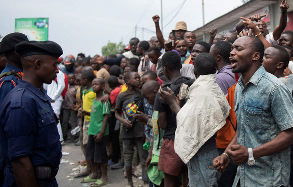 Congolese police face off with protesters near a compound belonging to the UN peacekeeping mission in the Democratic Republic of Congo on 26 July 2022.
