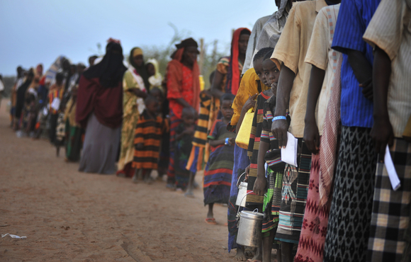 Newly arrived refugees wait to be processed at Dadaab refugee camp, northern Kenya. For generic use