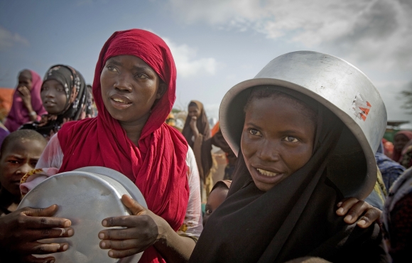Families queue for food in Badbado IDP camp, Mogadishu