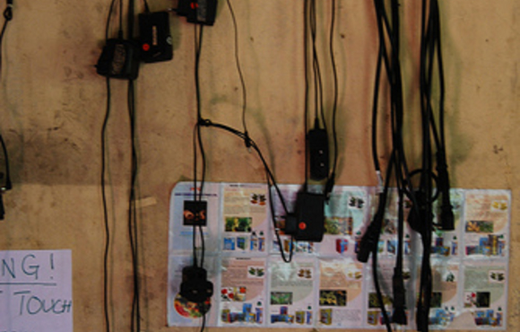 Lots of mobile chargers! as this is the only place that gets power within many hours walk, the community bring their phones here to get charged. Mobiles help them to communicate with people outwith the community and to feel part of the wider Kenya