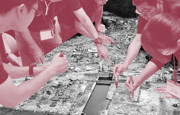 A composite art piece of several hands with markers pouring over earthquake damage. 