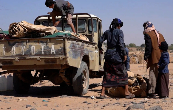 Displaced Yemenis leave a Marib camp where they had been sheltering after it was hit by a rocket in late December 2021.