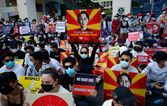Protesters demonstrating on 17 February 2021 against last year's military coup in Myanmar. Freedom of expression has been quashed in the country since the military took power, part of a broader global decline.