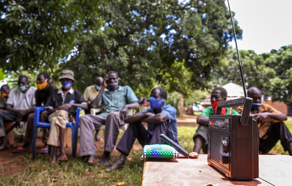 The community in Lukodi, where the Lord’s Resistance Army killed more than 60 people on 19 May 2004, gathered to hear the sentencing of rebel commander Dominic Ongwen by the International Criminal Court.