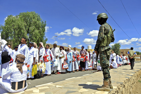 Yemeni prisoners wait to be released by Houthi rebels in Sana'a, on 30 September 2019.