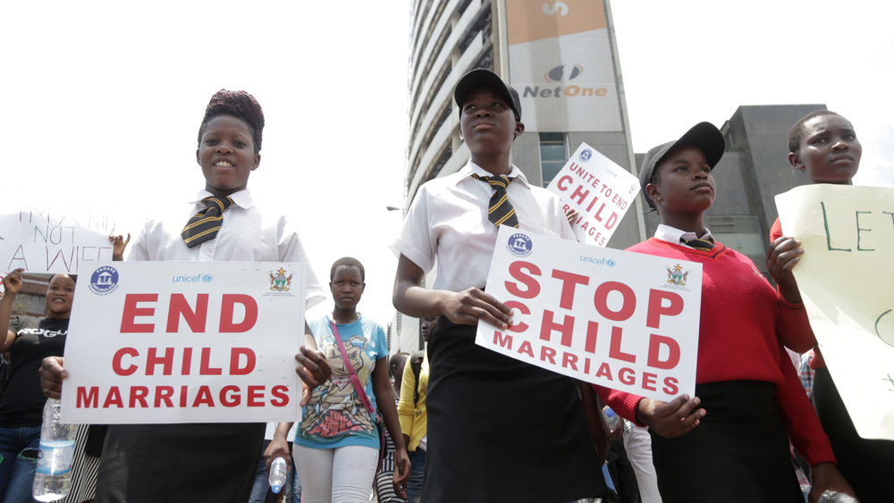 Schoolgirls in Harare, Zimbabwe, protest over child marriages.