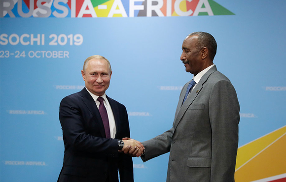 Russia's President Vladimir Putin shakes hands with head of Sudan's transitional sovereign council Abdel Fattah al-Burhan during a meeting on the sidelines of the Russia–Africa Summit in Sochi, Russia 23 October 2019.