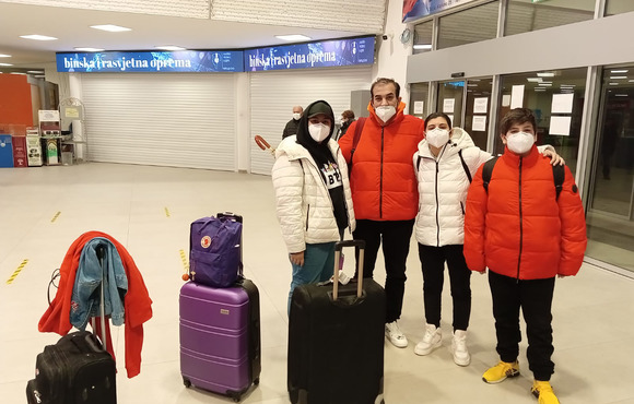 Mohammad al-Adday and his three children at Tuzla airport in Bosnia in March, before boarding their flight to Berlin. They waited for five years for Germany to grant them visas to join his wife, the children’s mother. 